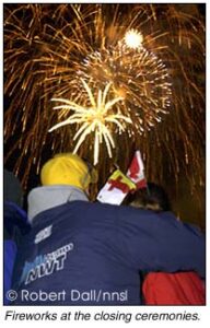 Two people looking at Fireworks at the Arctic Winter Games closing ceremonies