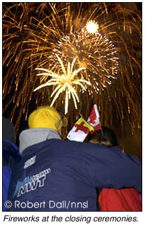 Two people looking at Fireworks at the Arctic Winter Games closing ceremonies