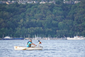 Ben Lobaugh in his Minto rowing across Commencement Bay near Tacoma, Washington